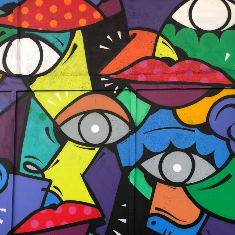 Bunte Farben wie bei einer Grafitti-Wand zeigen Augen und Lippen